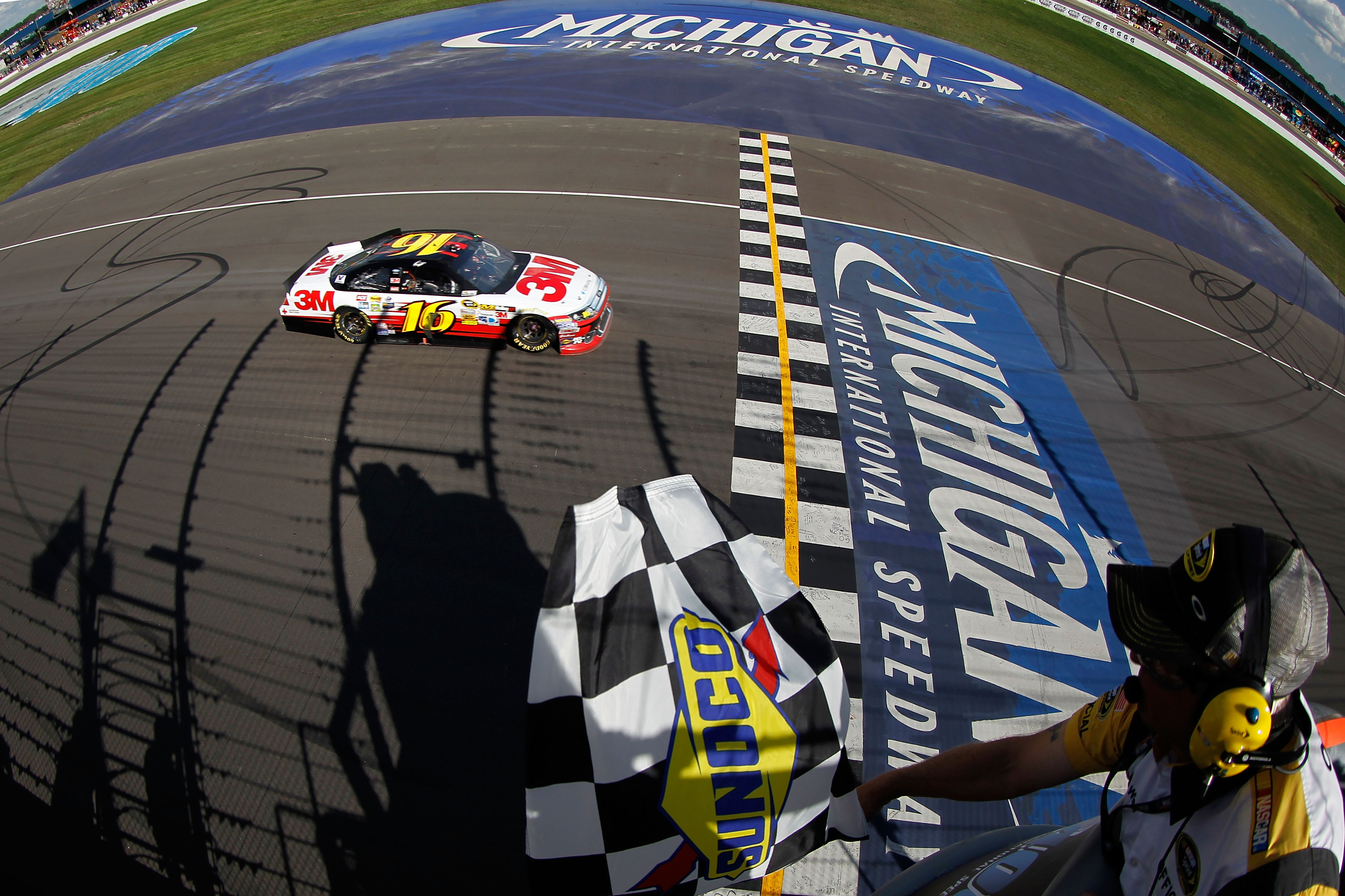 2012 Michigan Aug NSCS Greg Biffle crosses finish line
